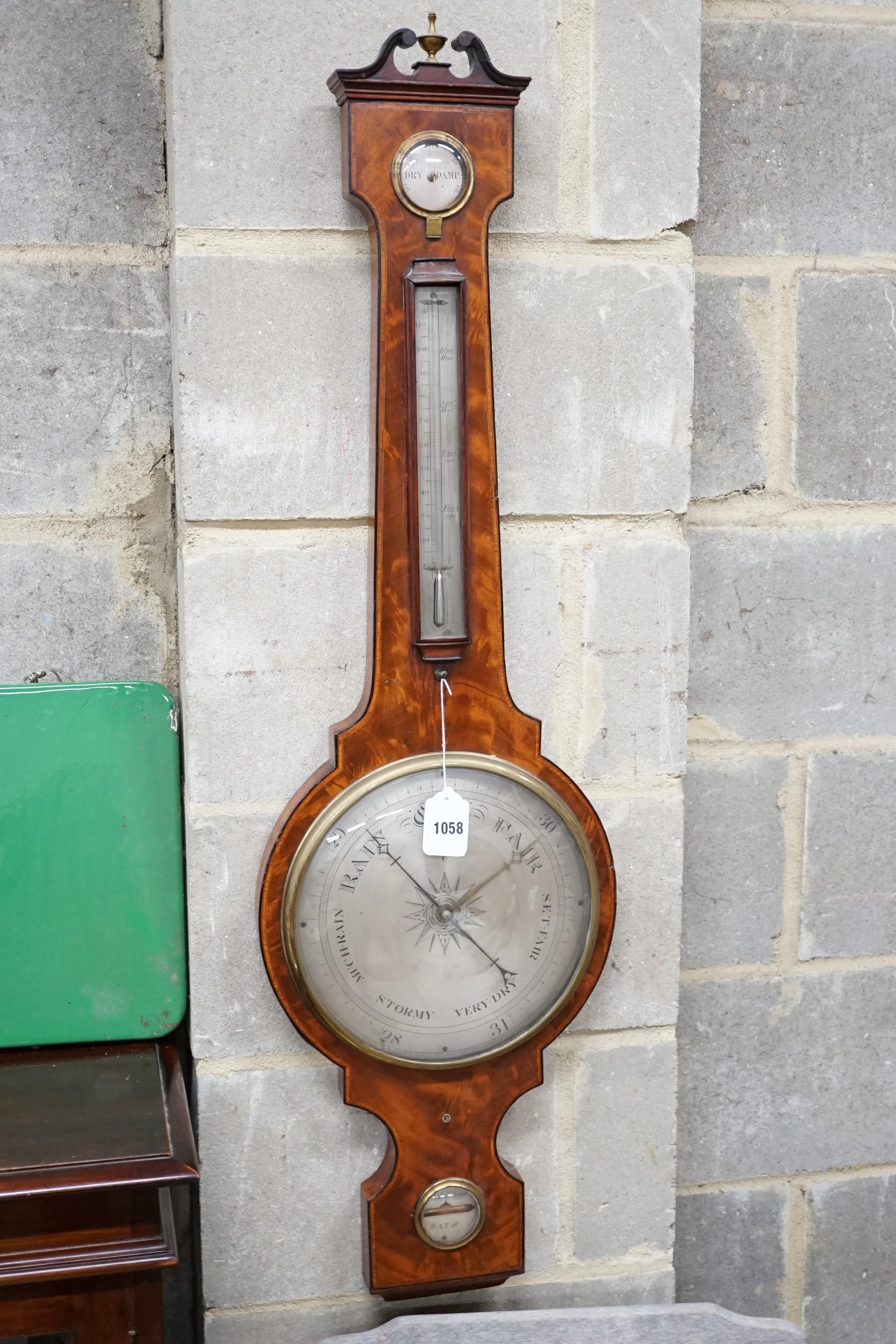 P Salmoni of Bath. A Regency ebony strung mahogany wheel barometer, height 110cm
